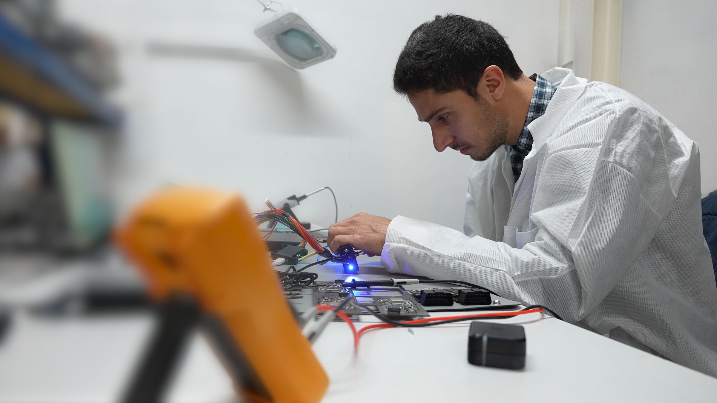 Picture of a worker with AT One tool